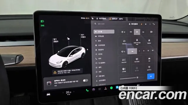 Tesla Model 3 — Фото автомобиля 30