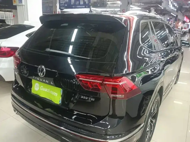 Volkswagen Tiguan L — Фото автомобиля 6