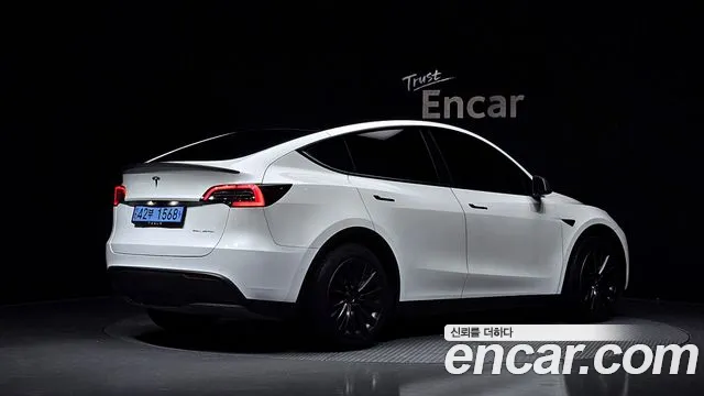 Tesla Model Y — Фото автомобиля 2