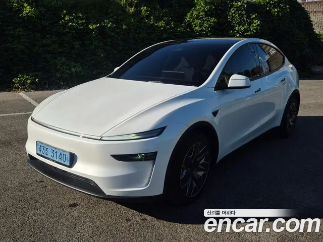 Tesla Model Y — Фото автомобиля 5