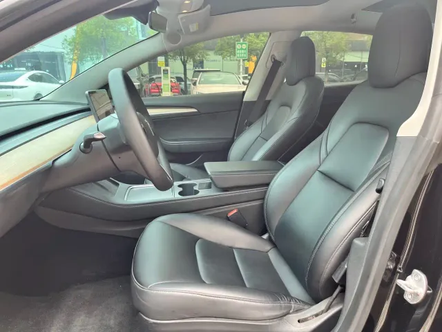 Tesla Model 3 — Фото автомобиля 11