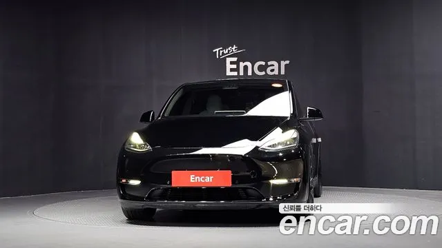Tesla Model Y — Фото автомобиля 3