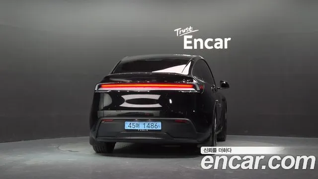 Tesla Model Y — Фото автомобиля 4