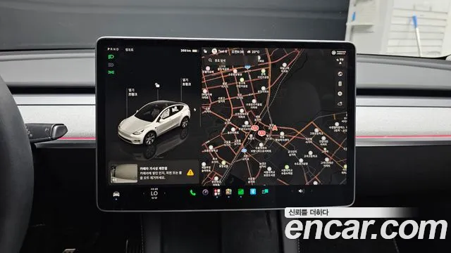 Tesla Model Y — Фото автомобиля 18