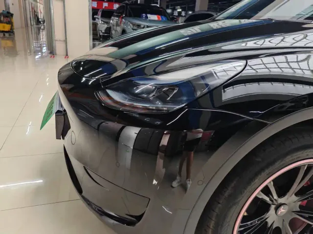 Tesla Model Y — Фото автомобиля 19