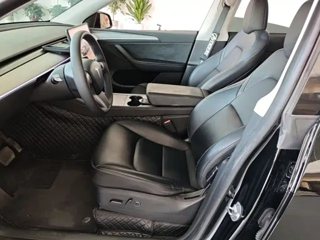 Tesla Model Y — Фото автомобиля 14