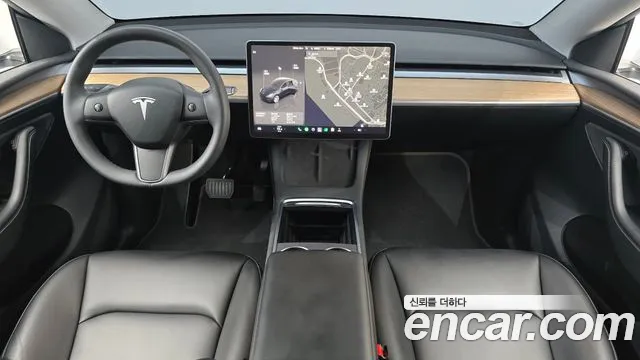 Tesla Model Y — Фото автомобиля 7