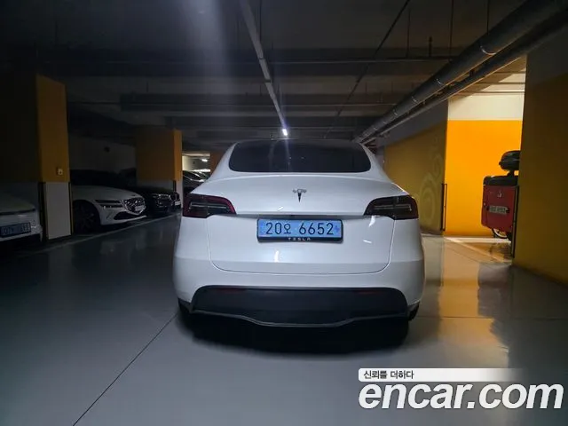 Tesla Model Y — Фото автомобиля 6