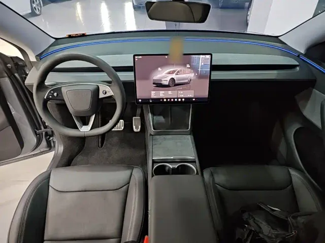 Tesla Model Y — Фото автомобиля 9