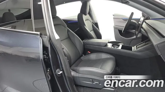 Tesla Model Y — Фото автомобиля 11