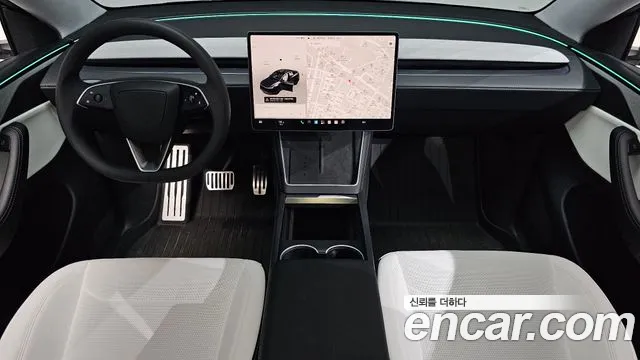 Tesla Model Y — Фото автомобиля 7