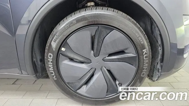 Tesla Model Y — Фото автомобиля 6