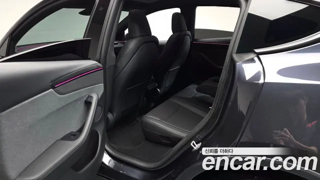 Tesla Model Y — Фото автомобиля 16