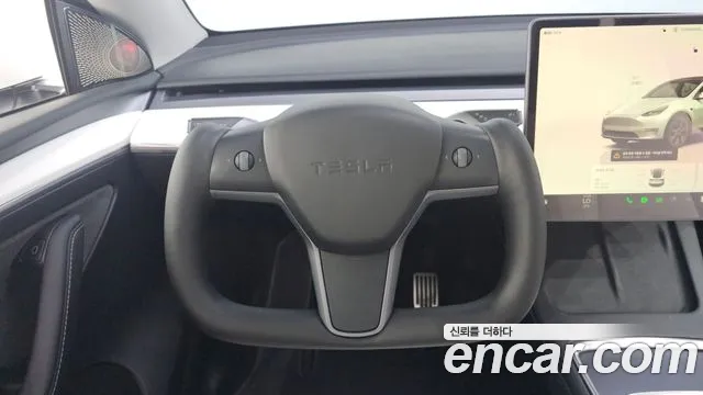 Tesla Model Y — Фото автомобиля 17
