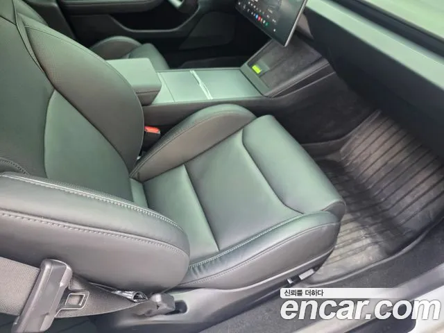 Tesla Model 3 — Фото автомобиля 16