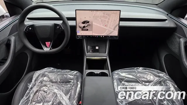 Tesla Model Y — Фото автомобиля 7