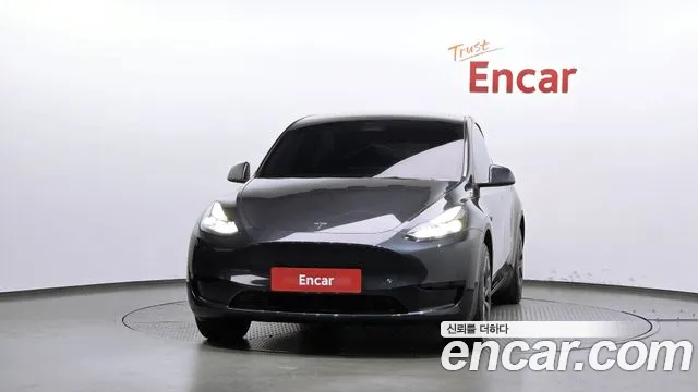 Tesla Model Y — Фото автомобиля 3