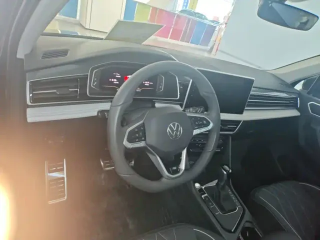 Volkswagen Tiguan L — Фото автомобиля 9