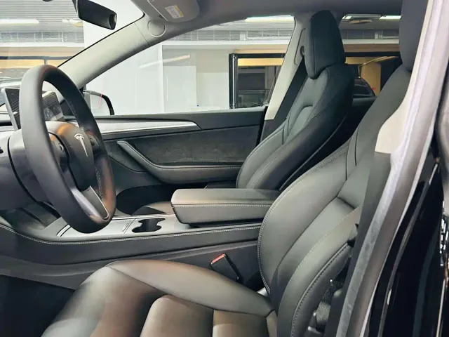 Tesla Model Y — Фото автомобиля 4
