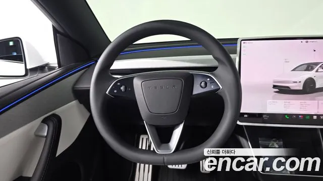 Tesla Model Y — Фото автомобиля 19