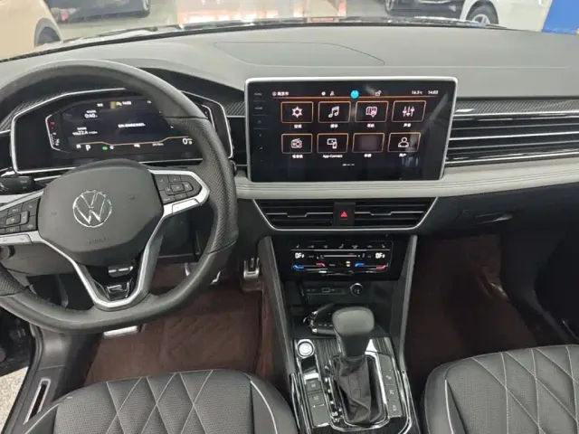 Volkswagen Tiguan L — Фото автомобиля 9