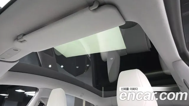 Tesla Model Y — Фото автомобиля 24