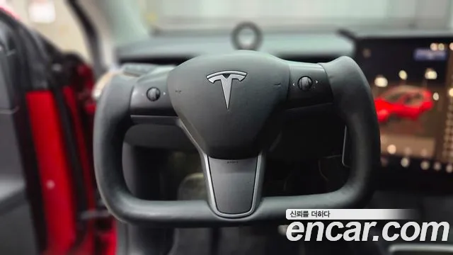 Tesla Model Y — Фото автомобиля 13