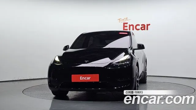 Tesla Model Y — Фото автомобиля 3