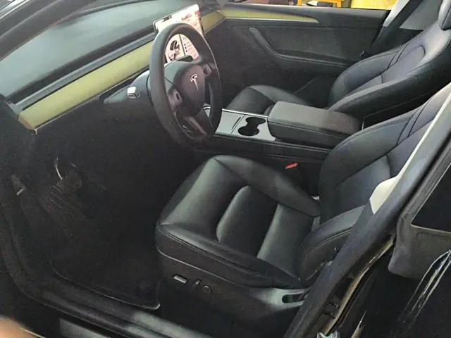 Tesla Model Y — Фото автомобиля 9