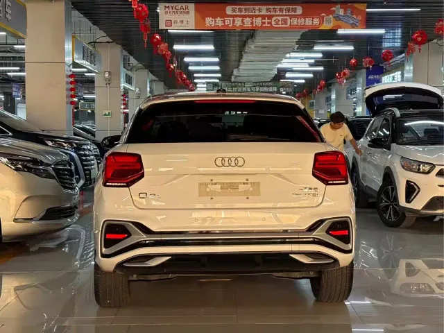 Audi Q2L — Фото автомобиля 7