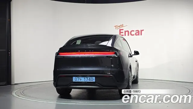 Tesla Model Y — Фото автомобиля 4