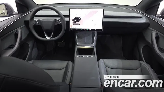 Tesla Model Y — Фото автомобиля 6