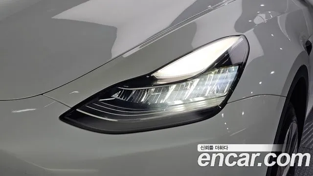 Tesla Model Y — Фото автомобиля 19