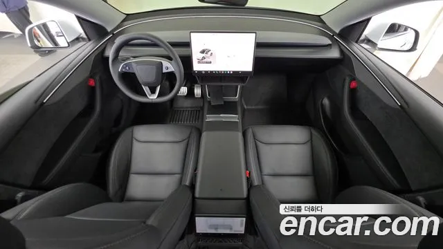 Tesla Model Y — Фото автомобиля 10