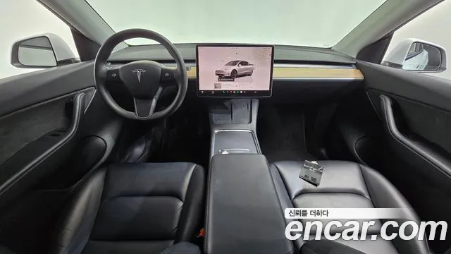 Tesla Model Y — Фото автомобиля 7