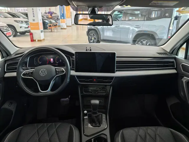 Volkswagen Tiguan L — Фото автомобиля 9
