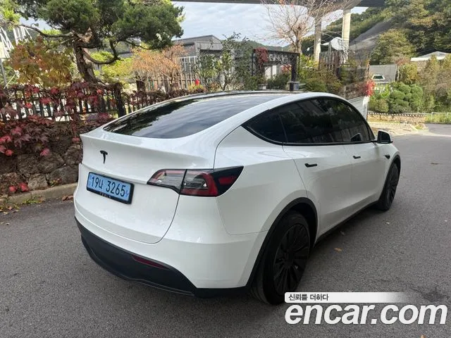 Tesla Model Y — Фото автомобиля 4