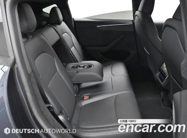Tesla Model Y — Фото автомобиля 12