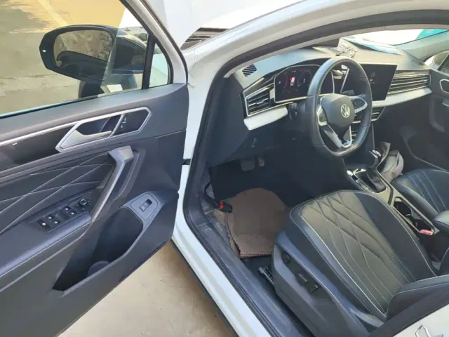 Volkswagen Tiguan L — Фото автомобиля 15