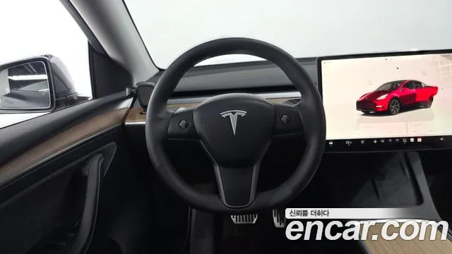 Tesla Model Y — Фото автомобиля 18