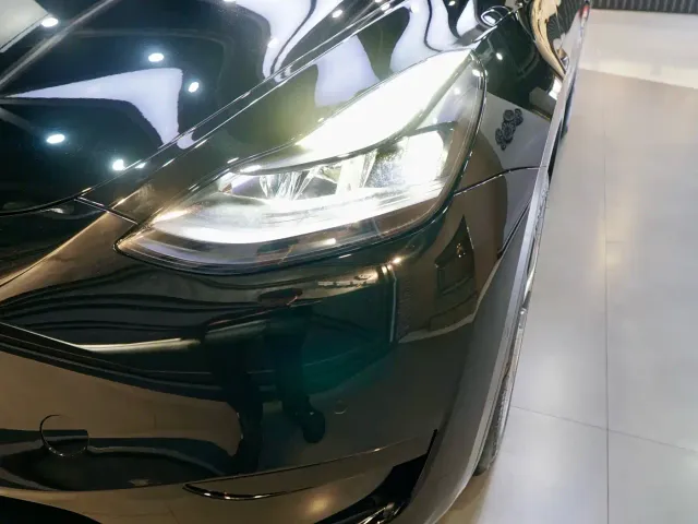 Tesla Model Y — Фото автомобиля 18