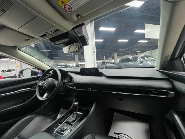 Mazda Axela — Фото автомобиля 13