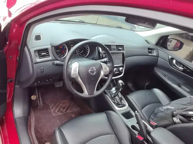 Nissan Tiida — Фото автомобиля 9