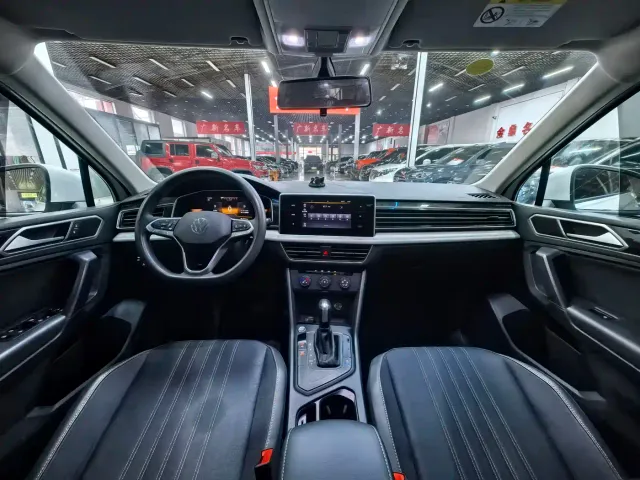 Volkswagen Tiguan L — Фото автомобиля 4