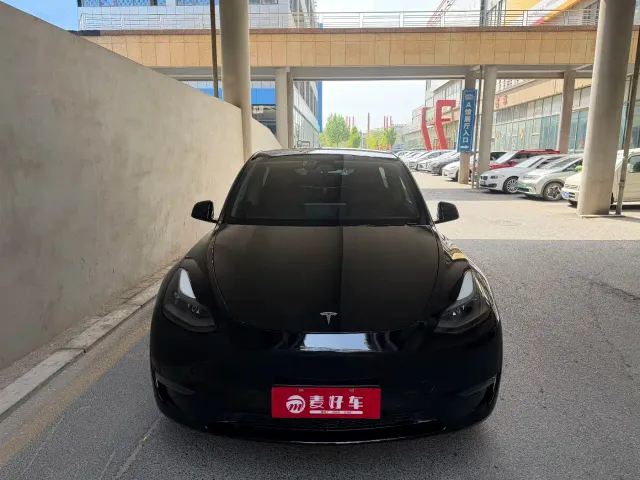 Tesla Model Y — Фото автомобиля 6