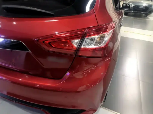 Nissan Tiida — Фото автомобиля 7
