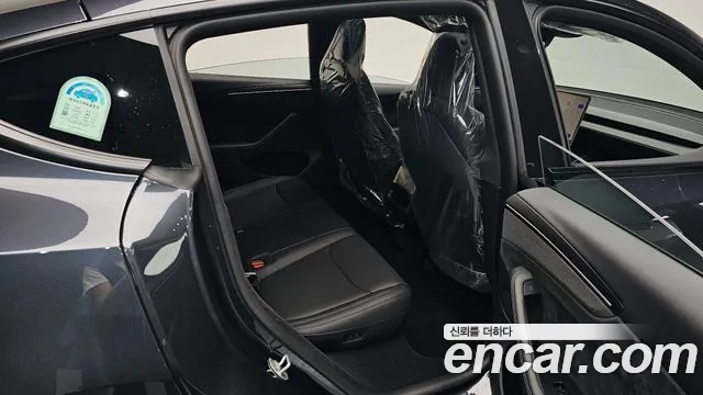 Tesla Model Y — Фото автомобиля 11