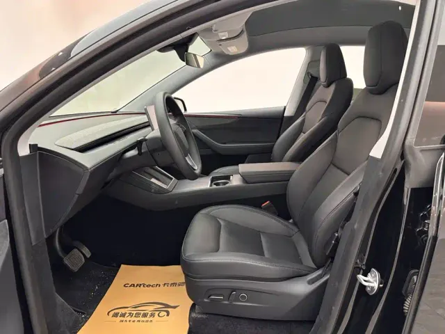Tesla Model Y — Фото автомобиля 8