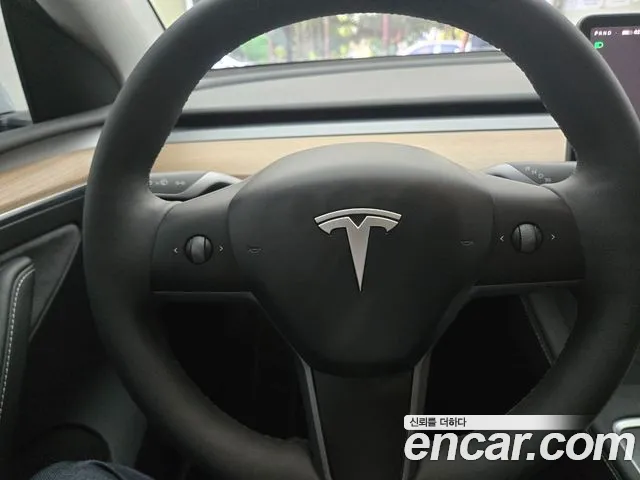 Tesla Model Y — Фото автомобиля 7