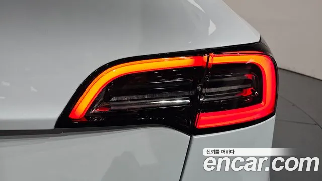Tesla Model Y — Фото автомобиля 7